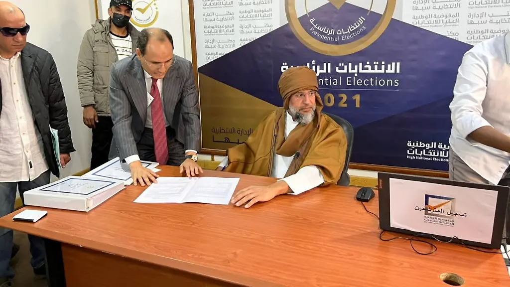 2021-11-14T110747Z-2096967488-RC2BUQ9W8N6K-RTRMADP-3-LIBYA-ELECTION-GADDAFI