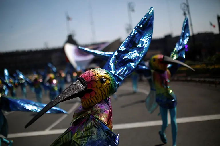 2021-10-31T224842Z-1489836397-RC21LQ9CQTDD-RTRMADP-3-MEXICO-DAYOFTHEDEAD-PARADE