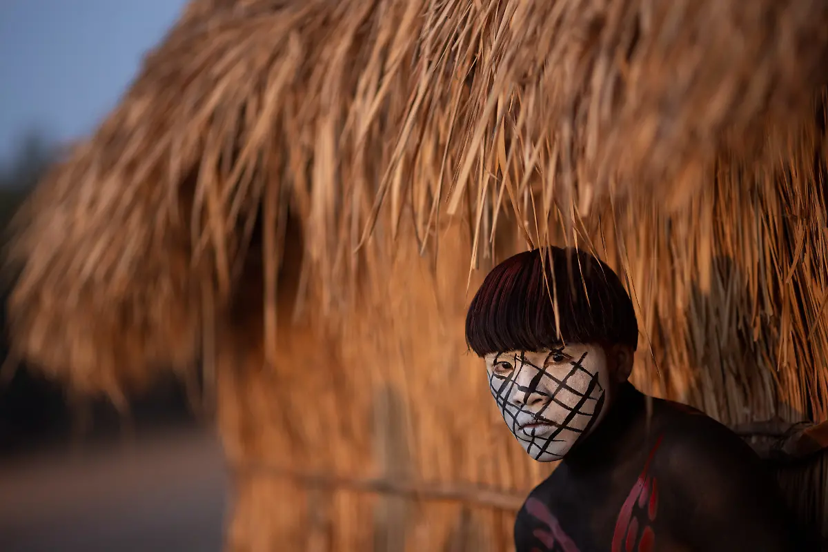 A-Yawalapiti-man-waits-before-taking-part-in-a-wrestling-match