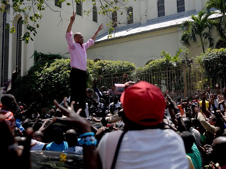 ... und Michael Martelly.