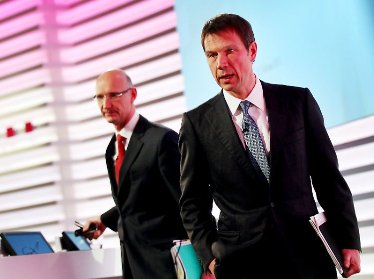 Nur wenige Gerüchte drangen bis an den Markt: Finanzchef Timotheus Höttges und Rene Obermann bei der Bilanzpressekonferenz.