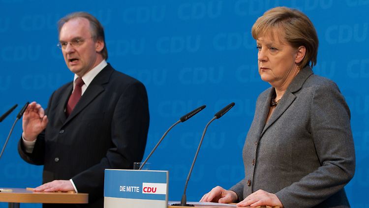 Merkel mit Wahlsieger Haseloff. Beide wollen mit der SPD weitermachen.