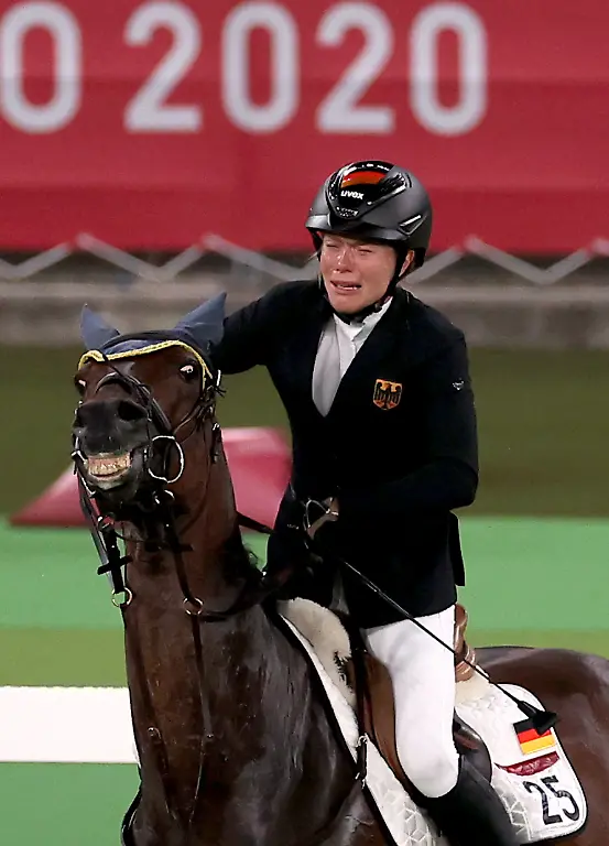 2021-08-06T101900Z-1214842451-SP1EH860SNLON-RTRMADP-3-OLYMPICS-2020-MPN-W-INDIVID-EQ