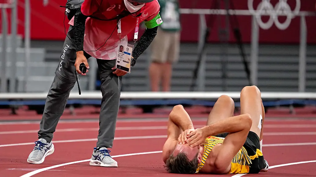 2021-08-04T125518Z-107940950-MT1USATODAY16508693-RTRMADP-3-OLYMPICS-ATHLETICS-AUG-4-EVENING-SESSION