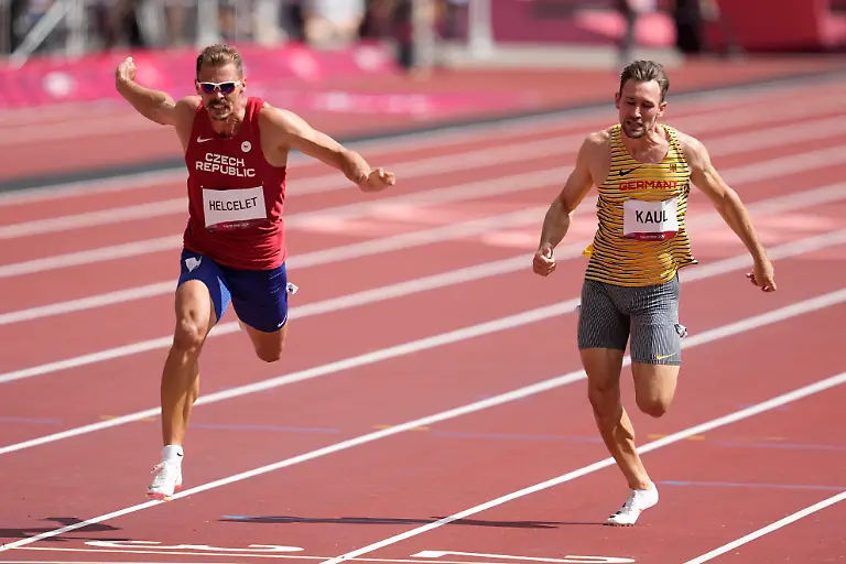 2021-08-04T020722Z-1603473057-MT1USATODAY16506098-RTRMADP-3-OLYMPICS-ATHLETICS-AUG-4-MORNING-SESSION