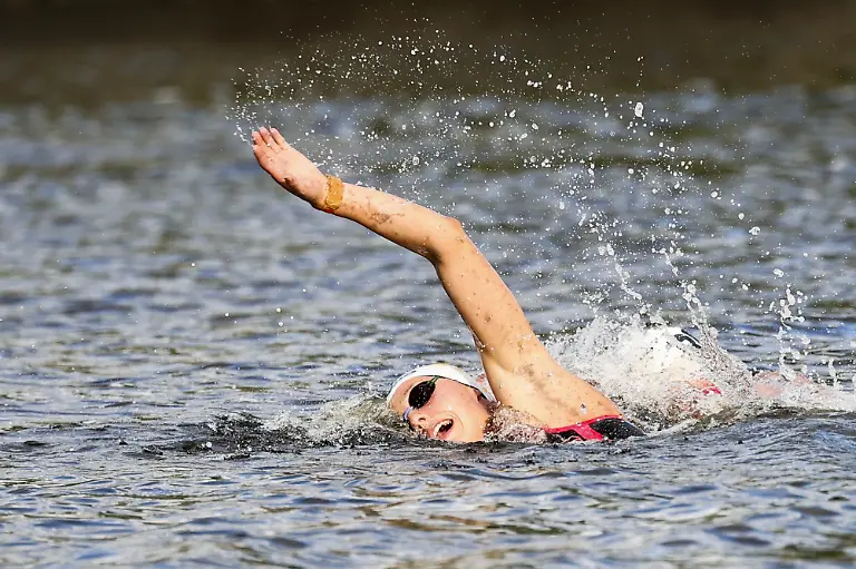 2021-08-03T213826Z-668383271-SP1EH831O3Z03-RTRMADP-3-OLYMPICS-2020-OWS-W-10KM-FNL