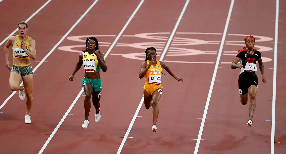 2021-07-31T103203Z-1280566913-SP1EH7V0T9CVQ-RTRMADP-3-OLYMPICS-2020-ATH-W-100M-SFNL-000200