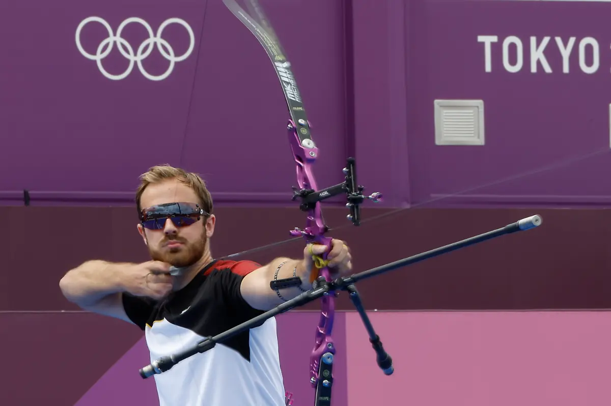 2021-07-31T033736Z-515703175-MT1USATODAY16484120-RTRMADP-3-OLYMPICS-ARCHERY-JULY-31