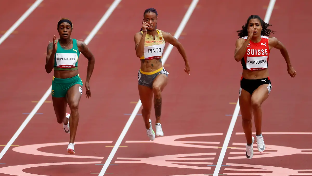 2021-07-30T033241Z-1729659993-SP1EH7U09UEMP-RTRMADP-3-OLYMPICS-2020-ATH-W-100M-RND1