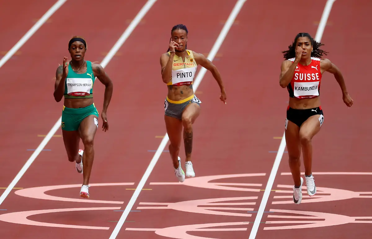 2021-07-30T033241Z-1729659993-SP1EH7U09UEMP-RTRMADP-3-OLYMPICS-2020-ATH-W-100M-RND1