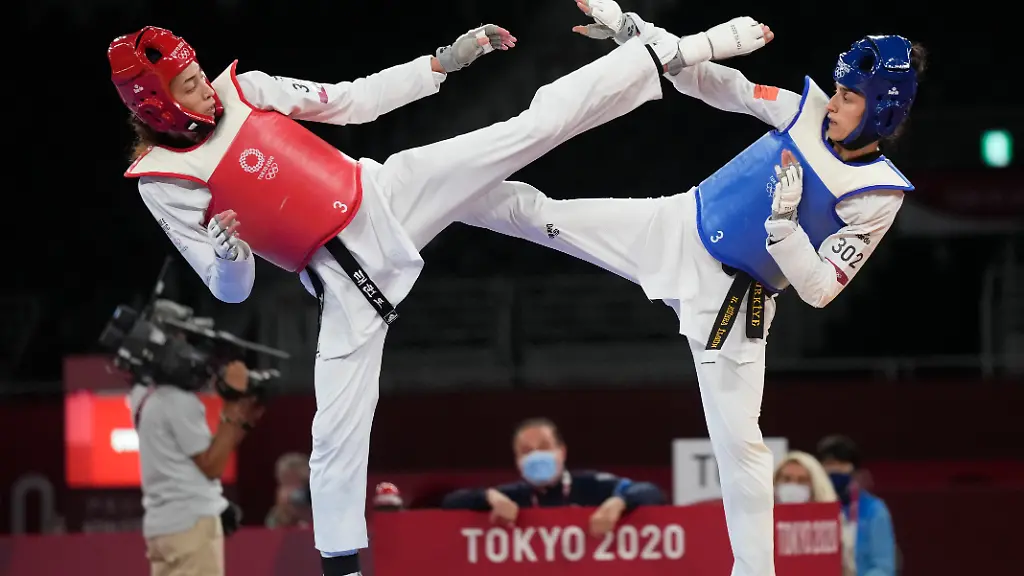 2021-07-25T122208Z-1423266896-MT1USATODAY16451429-RTRMADP-3-OLYMPICS-TAEKWONDO-JULY-25