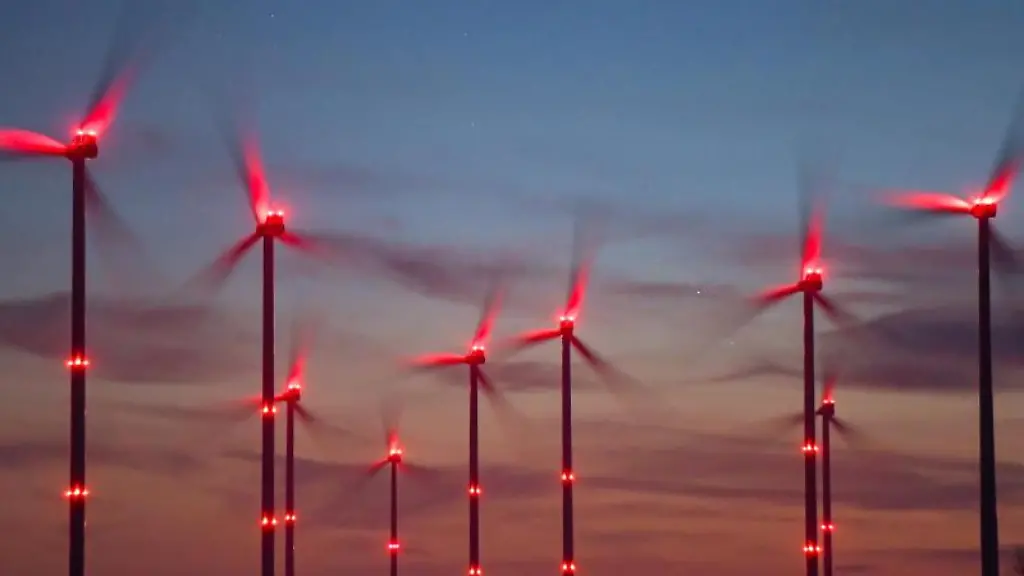 Rote-Positionslichter-leuchten-an-Windraedern-in-einem-Windenergiepark