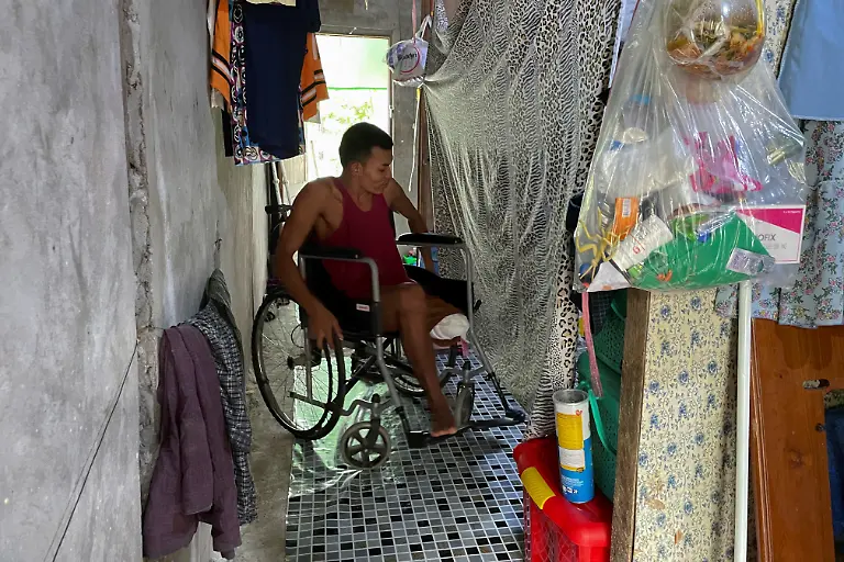 2021-05-28T230049Z-2137611927-RC222N9KDGTJ-RTRMADP-3-MYANMAR-POLITICS-VICTIM