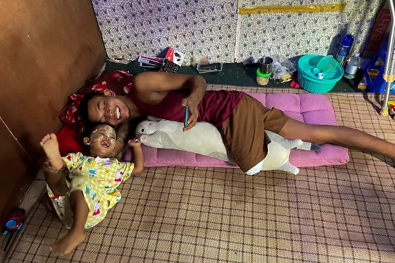 2021-05-28T230048Z-158274500-RC232N94RK23-RTRMADP-3-MYANMAR-POLITICS-VICTIM