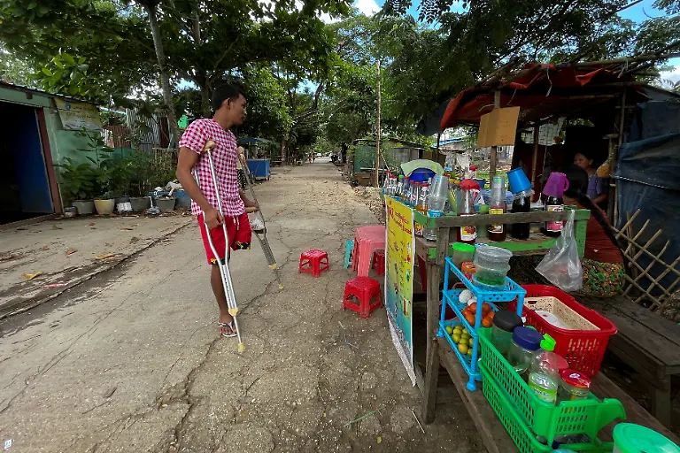 2021-05-28T230047Z-501114110-RC2RKN9K23UH-RTRMADP-3-MYANMAR-POLITICS-VICTIM