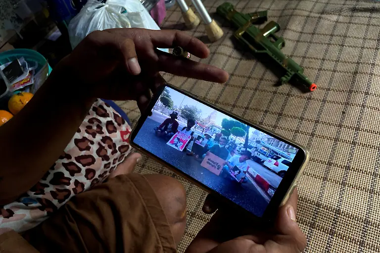 2021-05-28T230057Z-1262045832-RC279N93HU81-RTRMADP-3-MYANMAR-POLITICS-VICTIM