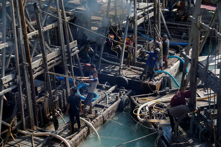 2021-06-07T230141Z-1992057988-RC2P6N95S7AT-RTRMADP-3-INDONESIA-TIN