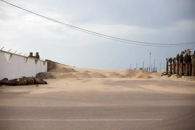 2021-05-12T100058Z-1186393927-RC27AA937JTV-RTRMADP-3-MOROCCO-SURFING