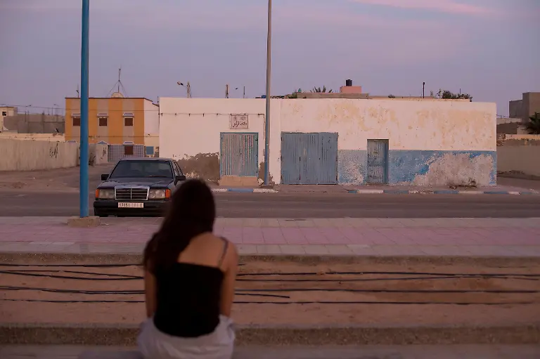 2021-05-12T100053Z-635449225-RC2AAA9SDOGD-RTRMADP-3-MOROCCO-SURFING