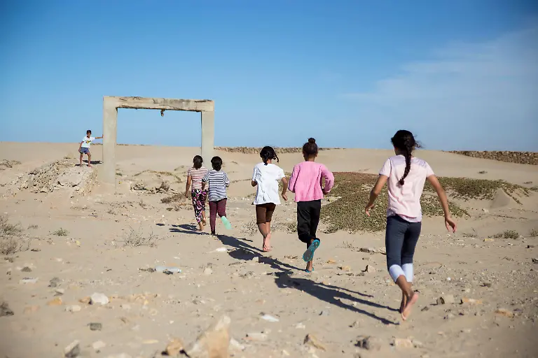 2021-05-12T100056Z-1521489381-RC2UKA9ZDG5T-RTRMADP-3-MOROCCO-SURFING