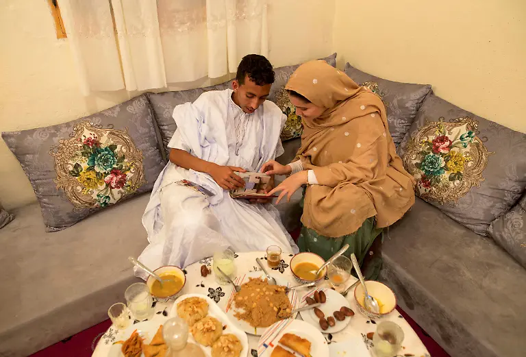 2021-05-12T100100Z-1836996195-RC2PJD9IOEED-RTRMADP-3-MOROCCO-SURFING