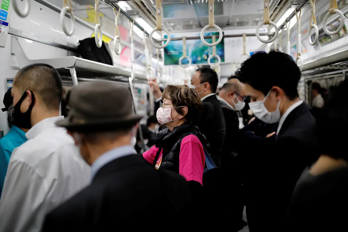 2021-04-05T094705Z-101643511-RC2LPM9AXE5Y-RTRMADP-3-OLYMPICS-2020-TOKYO-CHEER-DANCERS