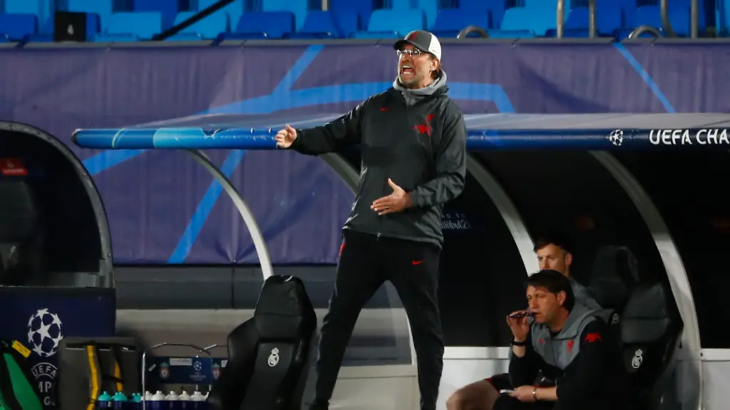 2021-04-06T191629Z-1756532261-UP1EH461HJFMW-RTRMADP-3-SOCCER-CHAMPIONS-MAD-LIV-REPORT