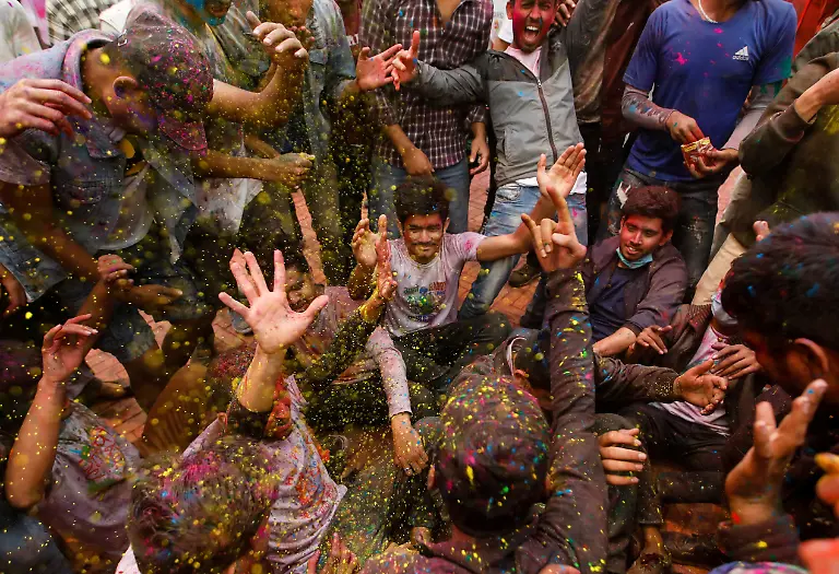 2021-03-28T095308Z-654757574-RC29KM9SY9R5-RTRMADP-3-FESTIVAL-HOLI-NEPAL