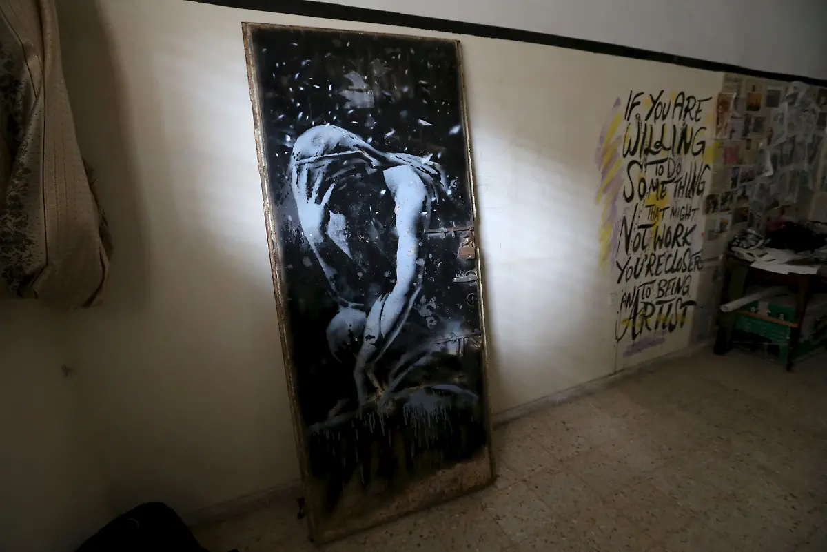 2015-04-01T120000Z-384987240-GF10000046237-RTRMADP-3-LIFE-GAZA-BANKSY