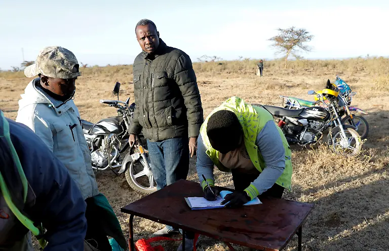2021-02-22T100225Z-513334347-RC2MXL9ETH96-RTRMADP-3-KENYA-LOCUSTS-HARVESTING
