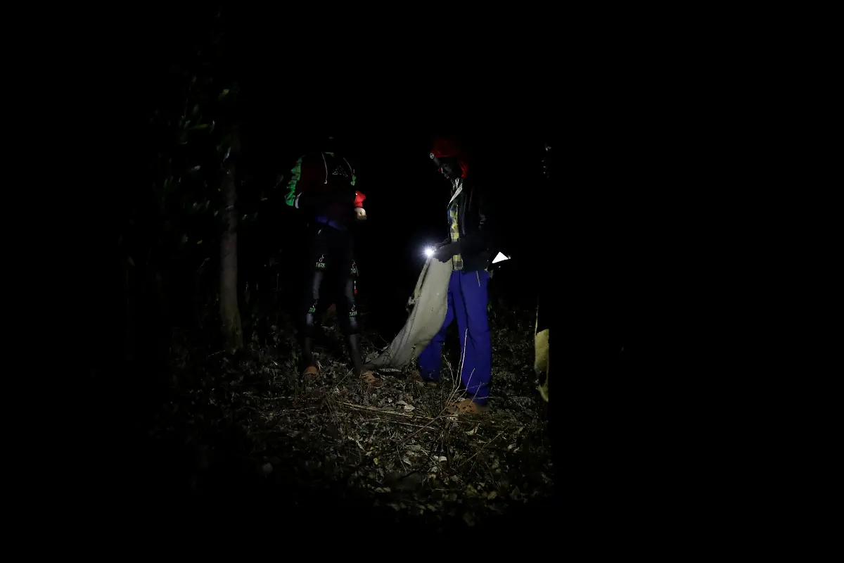 2021-02-22T100204Z-2106287835-RC2MXL92XLY8-RTRMADP-3-KENYA-LOCUSTS-HARVESTING