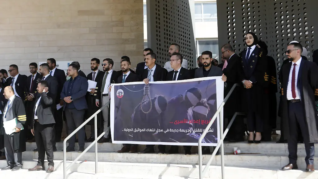 HEBRON-WEST-BANK-NOVEMBER-09-A-group-of-lawyers-gather-to-protest-the-Israeli-KnessetAeos-National-Security-CommitteeAeos-draft-law-that-imposing-the-death-penalty-for-Palestinian-detainees-on-November-09-2025-in-Hebron-West-Bank