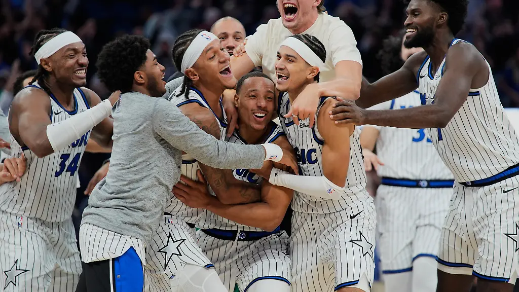 Orlando-Magic-guard-Desmond-Bane-center-celebrates-with-teammates-after-making-a-game-winning-shot-against-the-Portland-Trail-Blazers-at-the-buzzer-in-an-NBA-basketball-game-Monday-Nov-10-2025-in-Orlando-Fla