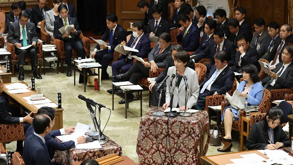 Japanese-Prime-Minister-Sanae-Takaichi-answers-a-question-at-a-Budget-Committee-meeting-of-the-House-of-Representatives-on-Monday-Nov-10-2025-Takaichi-declined-to-withdraw-a-remark-she-made-last-week-referring-to-a-so-called-survival-threatening-situation-regarding-a-potential-contingency-over-Taiwan