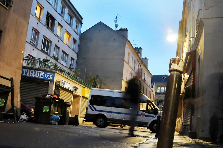 Police-Raid-Aftermath-Saint-Denis-Police-stand-guard-rue-du-Corbillon-in-Saint-Denis-northern-Paris-suburb-France-on-November-19-2015-where-French-Police-special-forces-raided-an-appartment-hunting-those-behind-the-attacks-that-claimed-129-lives-in-the-French-capital-five-days-ago-The-man-believed-to-be-the-ringleader-of-the-Paris-attacks-last-week-Abdelhamid-Abaaoud-was-one-of-those-killed-in-Wednesday-s-police-operation-Photo-by-Alain-Apaydin-ABACAPRESS