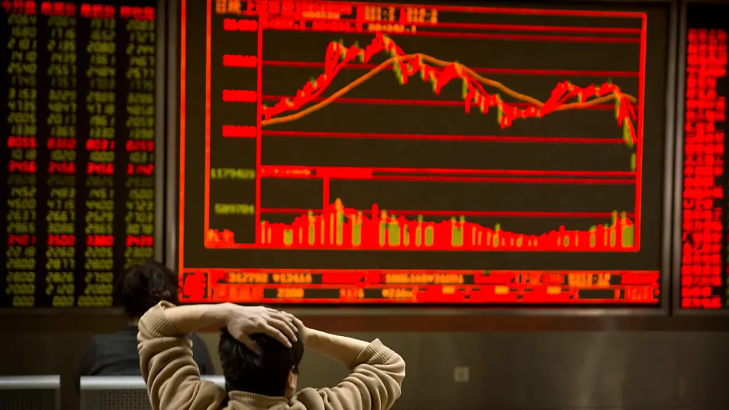 A-Chinese-investor-monitors-stock-prices-at-a-brokerage-house-in-Beijing-Friday-Feb-9-2018-Asian-stocks-plunged-Friday-after-Dow-Jones-industrials-on-Wall-Street-plummeted-more-than-1-000-points-deepening-a-week-long-sell-off