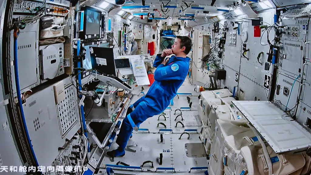 250926-BEIJING-Sept-26-2025-Xinhua-This-screen-image-captured-at-Beijing-Aerospace-Control-Center-on-Sept-25-2025-shows-Shenzhou-20-astronaut-Chen-Dong-working-inside-China-s-space-station-combination-The-Shenzhou-20-crew-aboard-China-s-orbiting-space-station-completed-their-mission-s-fourth-round-of-extravehicular-activities-on-Friday-according-to-the-China-Manned-Space-Agency-CMSA