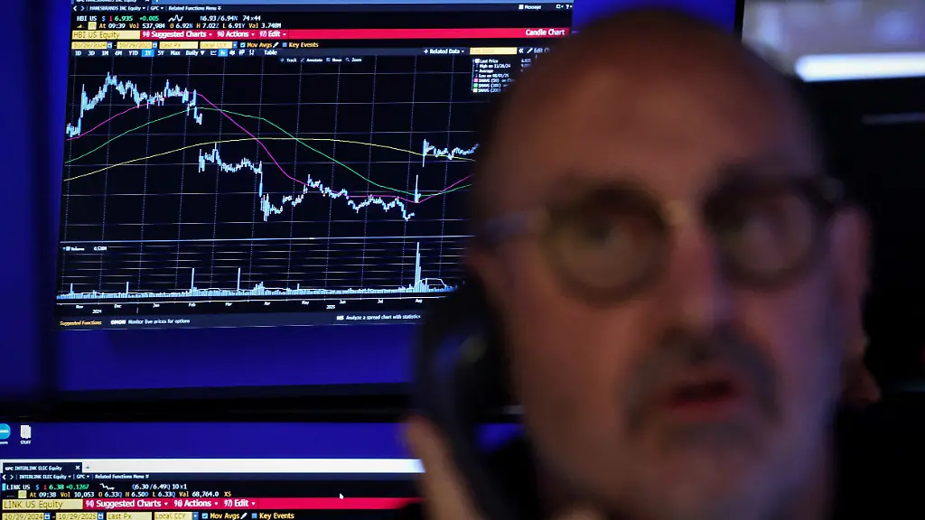 FILE-PHOTO-A-trader-works-on-the-floor-at-the-New-York-Stock-Exchange-NYSE-in-New-York-City-U-S-October-29-2025