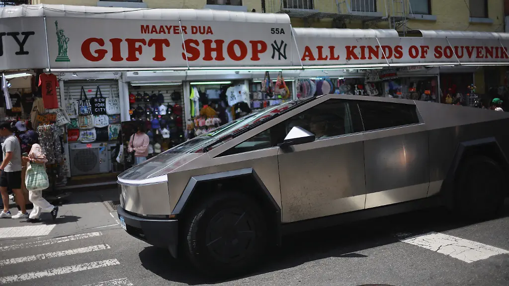 A-Tesla-Cybertruck-drives-in-Chinatown-in-New-York-City-U-S-July-5-2025
