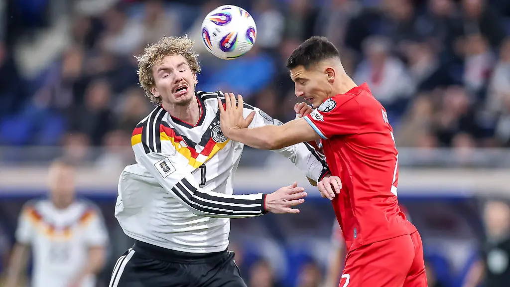 14-11-2025-Fussball-Laenderspiel-WM-Qualifikation-Europa-Deutschland-Luxemburg-Stade-de-Luxembourg-Croix-de-Gasperich-Luxemburg-9-Spieltag-Saison-2025-2026-Nick-Woltemade-GER-11-im-Zweikampf-gegen-Seid-Korac-LUX-02-Regulations-prohibit-any-use-of-photographs-as-image-sequences-and-or-quasi-video