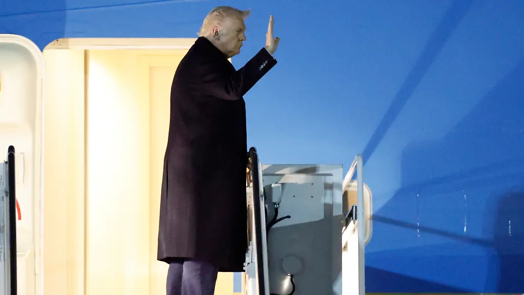 President-Donald-Trump-waves-from-the-stairs-of-Air-Force-One-as-he-boards-upon-his-arrival-at-Joint-Base-Andrews-Md-Friday-Nov-14-2025-en-route-to-his-Mar-a-Lago-estate-in-Palm-Beach-Fla-AP-Photo-Luis-M