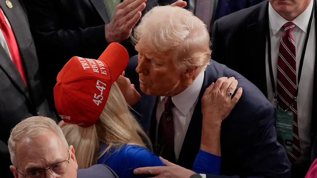 President-Donald-Trump-greets-Rep-Marjorie-Taylor-Greene-R-Ga-after-addressing-a-joint-session-of-Congress-in-the-House-chamber-at-the-U-S-Capitol-in-Washington-Tuesday-March-4-2025