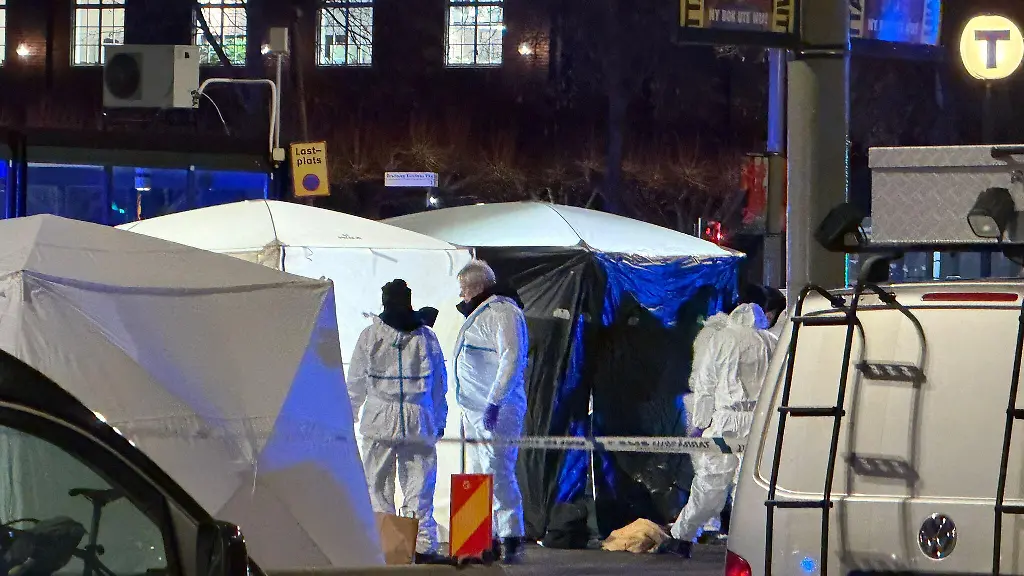 STOCKHOLM-SWEDEN-NOVEMBER-14-Forensic-investigations-are-carried-out-by-police-teams-at-the-scene-where-a-bus-crashed-in-to-people-in-the-Ostermalm-district-of-Stockholm-Sweden-on-November-14-2025-Swedish-Prime-Minister-Ulf-Kristersson-said-on-Friday-that-several-people-were-killed-and-injured-following-an-incident-at-a-bus-stop-in-central-Stockholm
