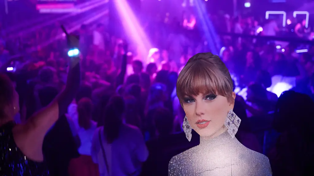 Ein-Aussteller-mit-dem-lebensgrossen-Foto-von-Taylor-Swift-steht-am-Rande-der-TanzflSche-auf-der-Party-der-Reihe-Taylor-Party-Europe-Taylor-Swift-Fans-feiern-in-ganz-Deutschland-die-Neuerscheinung-des-neuen-Swift-Albums-The-Life-of-a-Showgirl