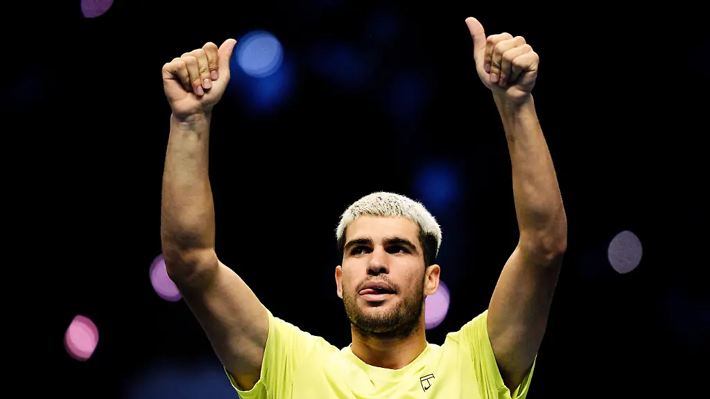 Spain-s-Carlos-Alcaraz-celebrate-victory-after-the-singles-semi-finals-tennis-match-of-the-ATP-World-Tour-Finals-against-Canada-s-Felix-Auger-Aliassime-at-the-Inalpi-Arena-in-Turin-Italy-Saturday-Nov-15-2025