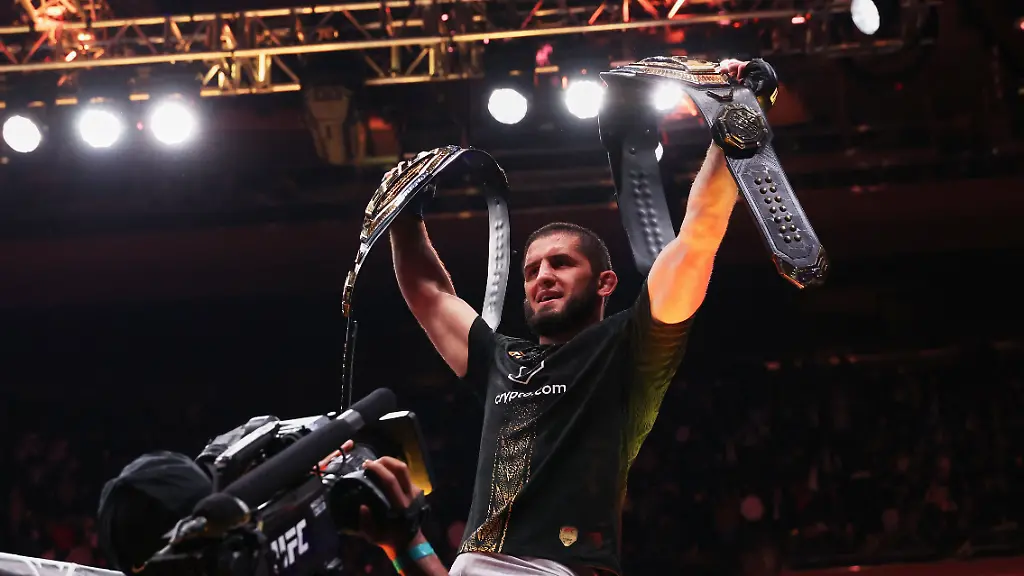 Nov-15-2025-New-York-NY-UNITED-STATES-Islam-Makhachev-blue-gloves-celebrates-after-defeating-Jack-Della-Maddalena-not-pictured-by-unanimous-decision-in-the-welterweight-championship-bout-during-UFC-322-at-Madison-Square-Garden