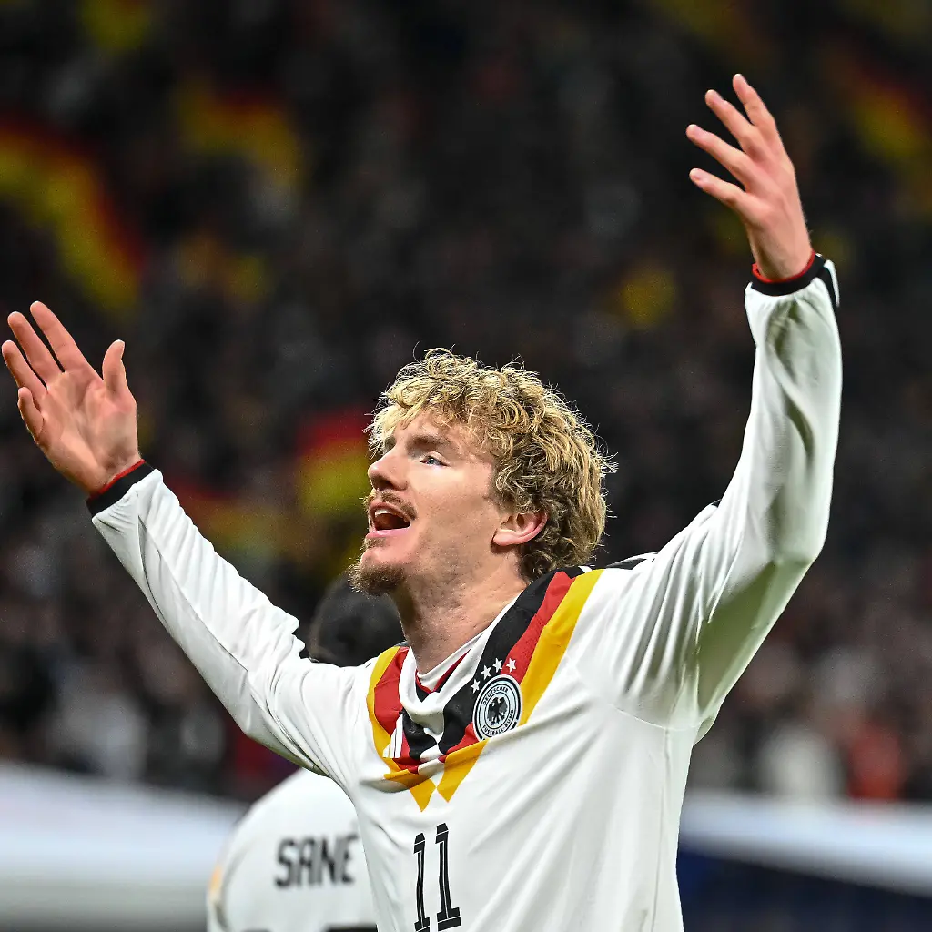 Nick-Woltemade-Germany-celebrates-after-scoring-his-team-s-first-goal-during-the-FIFA-World-Cup-WM-Weltmeisterschaft-Fussball-2026-qualifier-match-between-Germany-and-Slovakia-at-Red-Bull-Arena-on-November-17-2025-in-Leipzig-Germany