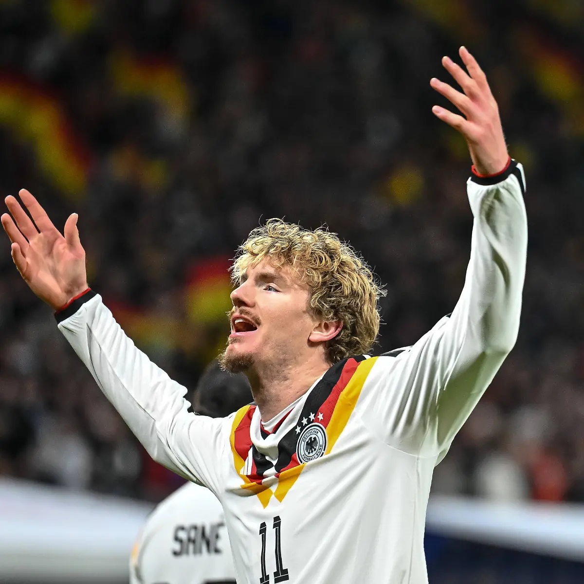 Nick-Woltemade-Germany-celebrates-after-scoring-his-team-s-first-goal-during-the-FIFA-World-Cup-WM-Weltmeisterschaft-Fussball-2026-qualifier-match-between-Germany-and-Slovakia-at-Red-Bull-Arena-on-November-17-2025-in-Leipzig-Germany