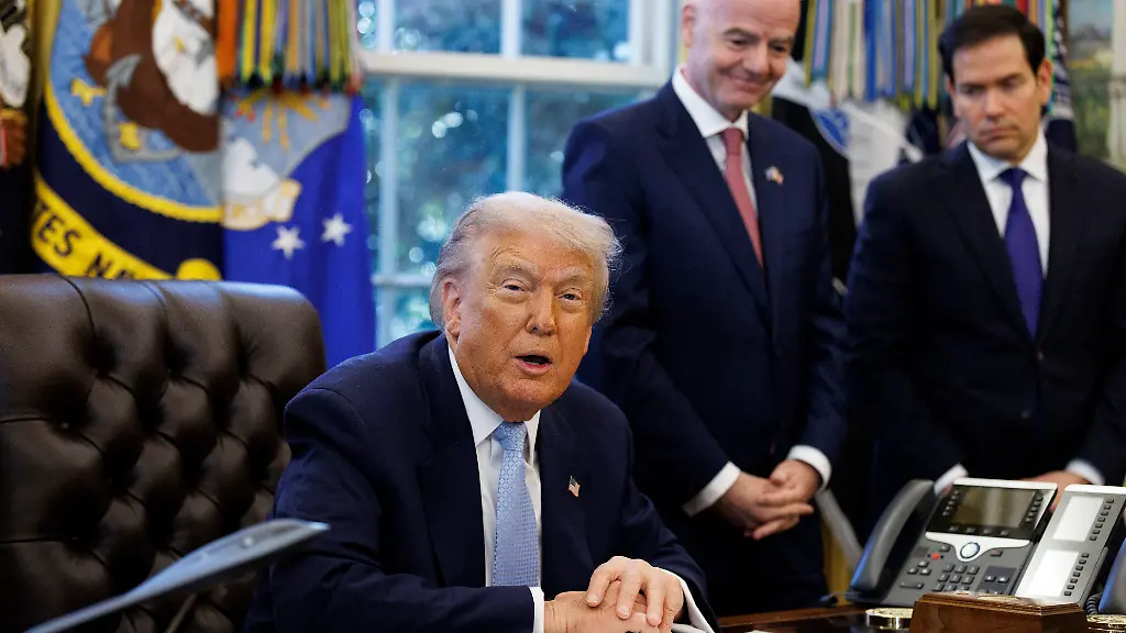 Gianni-Infantino-President-Federation-Internationale-de-Football-Association-FIFA-2-R-and-United-States-Secretary-of-State-Marco-Rubio-R-during-a-meeting-with-US-President-Donald-J-Trump-C-and-the-White-House-Task-Force-on-the-FIFA-World-Cup-2026-at-the-White-House-Washington-DC-USA-17-November-2025