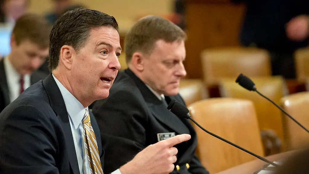 James-Comey-Director-of-the-Federal-Bureau-of-Investigation-left-and-Mike-Rogers-Director-of-the-National-Security-Agency-right-give-testimony-before-the-United-States-House-Permanent-Select-Committee-on-Intelligence-HPSCI-on-the-Russian-Active-Measures-Investigation-on-Capitol-Hill-in-Washington-DC-on-Monday-March-20-2017